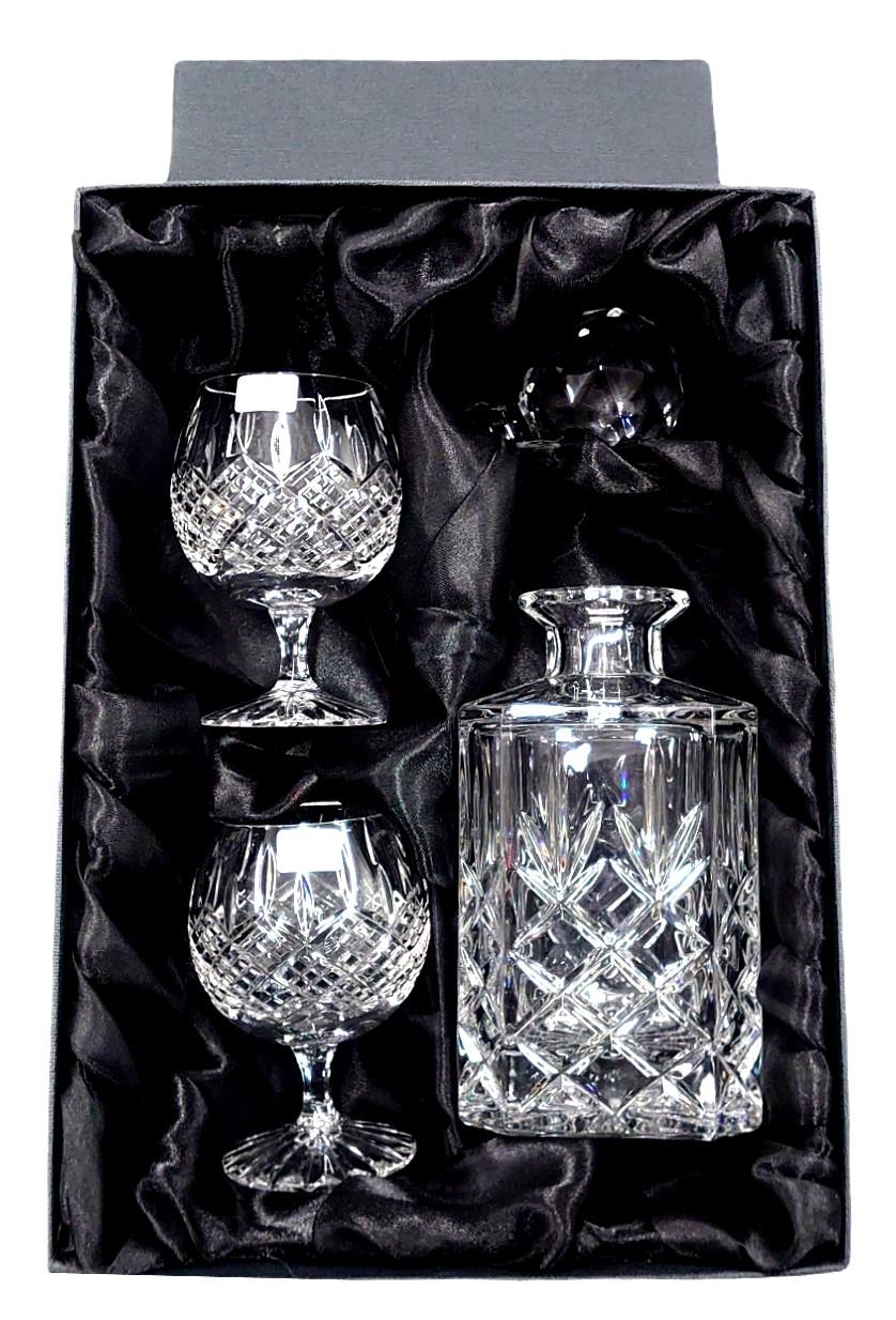 Square decanter & a pair of brandy glasses in silk lined